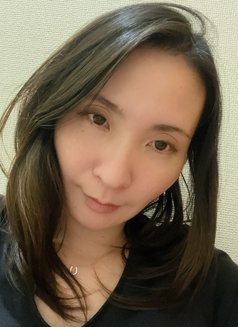 Sakura - masseuse in Okinawa Island Photo 12 of 12