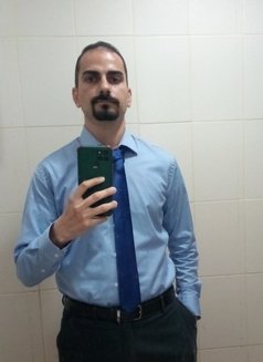 Sam - Male escort in Abu Dhabi Photo 1 of 2