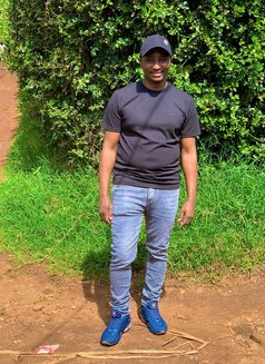 Sam - Male escort in Nairobi Photo 1 of 4