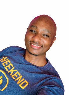 Sam - Male escort in Nairobi Photo 2 of 6