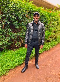 Sam - Male escort in Nairobi Photo 5 of 6
