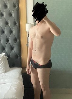 Sam - Male escort in Dubai Photo 3 of 5