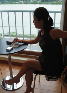 Sg Peijing - escort in Singapore Photo 1 of 3