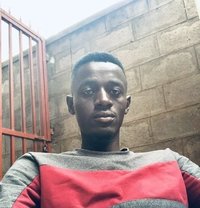 Simon - Male adult performer in Kampala