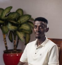 Simon - Male adult performer in Kampala