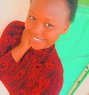 Smile - puta in Nairobi Photo 1 of 3