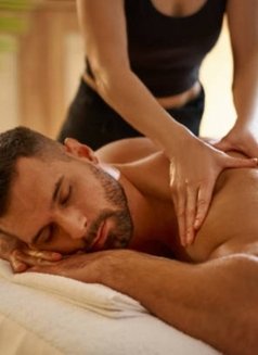 Professional therapeutic massage - escort in Al Manama Photo 1 of 5