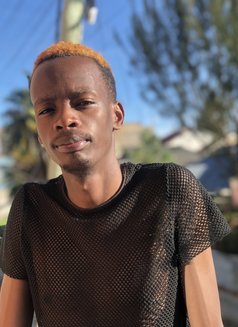Sterling - Male escort in Nairobi Photo 1 of 6