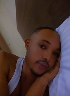Tash - Male escort in Kampala Photo 1 of 2