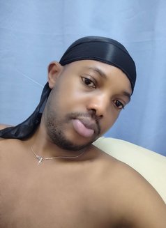 Tash - Male escort in Kampala Photo 2 of 2