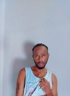 Thomas - Male escort in Nairobi Photo 1 of 4