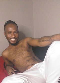 Thomas - Male escort in Nairobi Photo 2 of 4