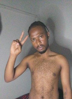 Thomas - Male escort in Nairobi Photo 3 of 4