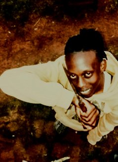 Timothy - Male escort in Nairobi Photo 2 of 3