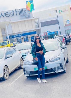 Tina - escort in Cotonou Photo 1 of 2