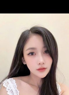 Tina - escort in Singapore Photo 2 of 4