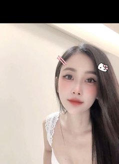 Tina - escort in Singapore Photo 3 of 4