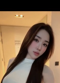 Tina - escort in Singapore Photo 2 of 5