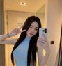 Tina - escort in Singapore Photo 4 of 5