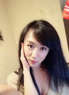 Tongtong - Transsexual escort in Beijing Photo 21 of 24