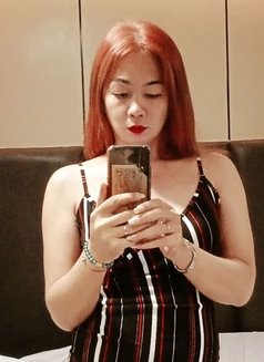 Tsmiyaka - Transsexual dominatrix in Manila Photo 11 of 12