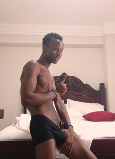 Uncut Dick - Male escort in Nairobi Photo 2 of 12