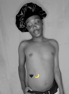 Uriah - Male escort in Nairobi Photo 5 of 5