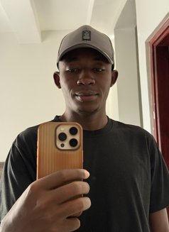 Vic - Male escort in Nairobi Photo 1 of 2