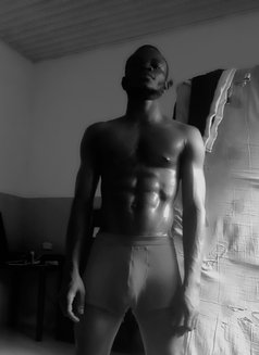 West - Male adult performer in Lagos, Nigeria Photo 2 of 2