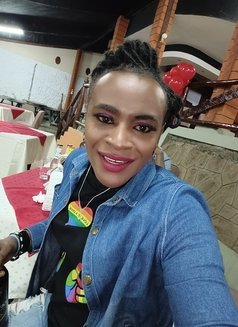 Xtina - Transsexual escort in Nairobi Photo 1 of 6