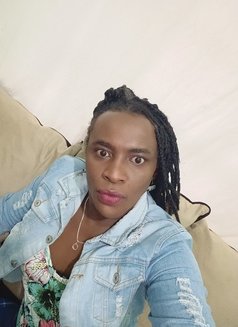 Xtina - Transsexual escort in Nairobi Photo 3 of 6